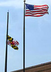United States Flag is at Full-Staf and Maryland Flag is at Half-Staff